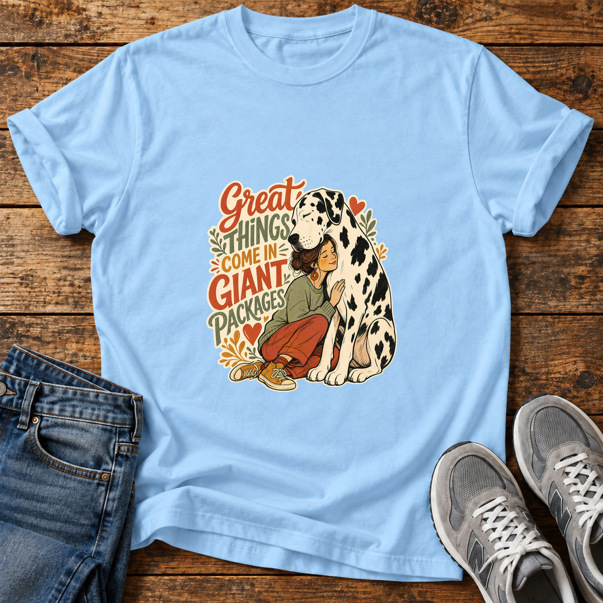 Giant Packages Great Dane graphic T-shirt in Light Blue, shown on a flat-lay shirt mockup