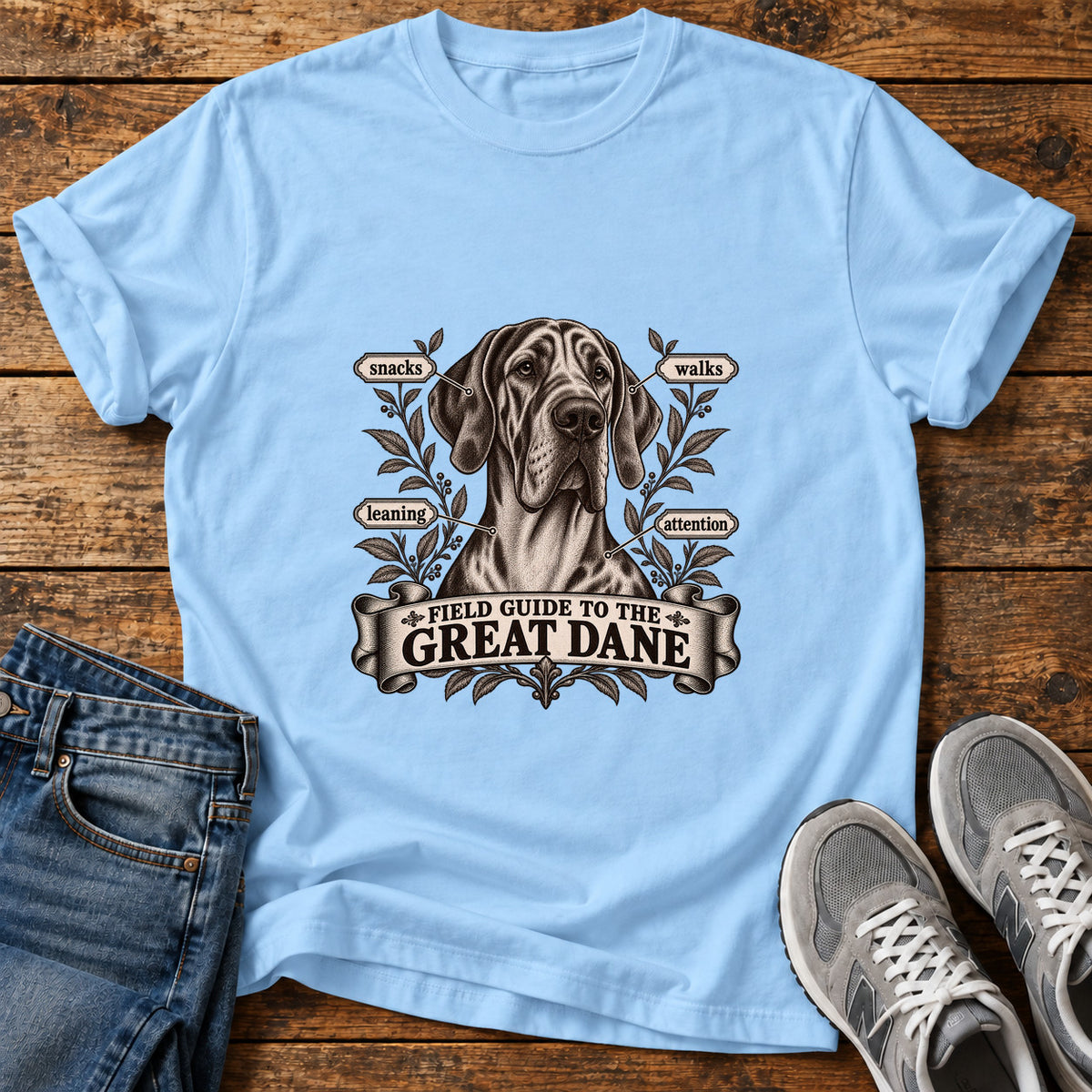 Great Dane Guide graphic T-shirt in Light Blue, shown on a flat-lay shirt mockup