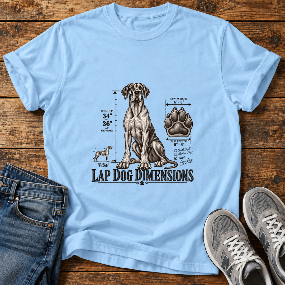 Lap Dog Dimensions Great Dane graphic T-shirt in Light Blue, shown on a flat-lay shirt mockup