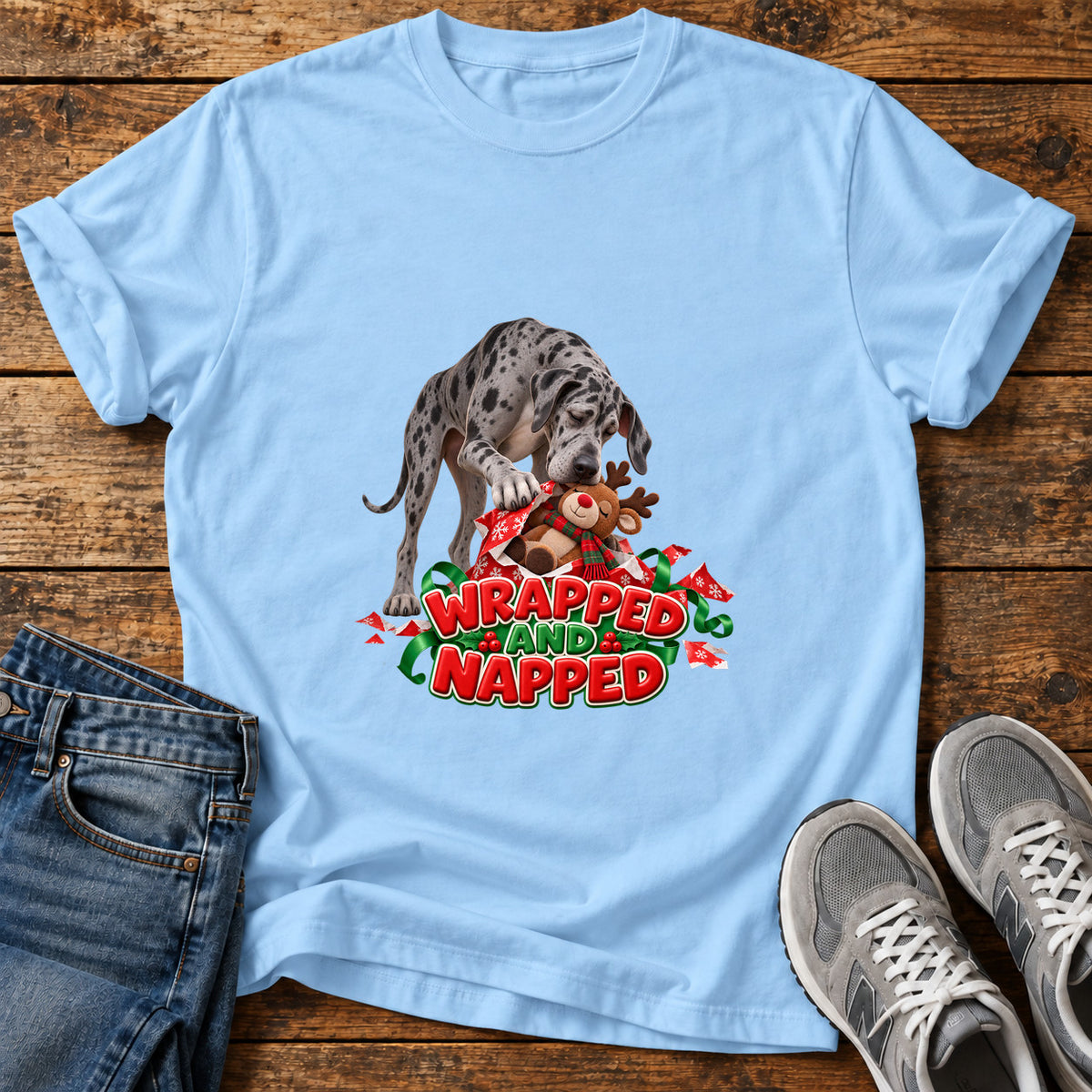 Wrapped Napped Great Dane graphic T-shirt in Light Blue, shown on a flat-lay shirt mockup