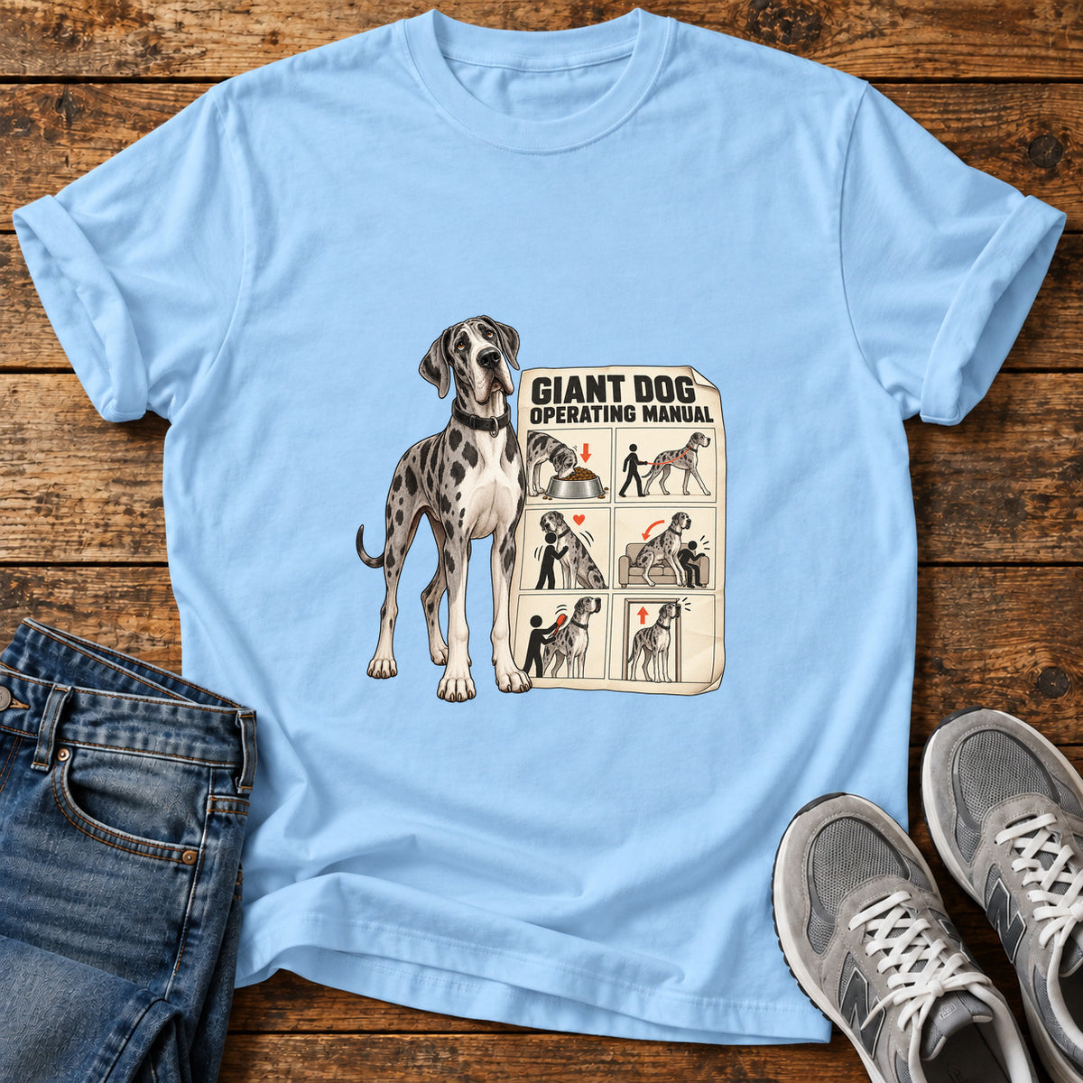 Giant Dog Guide Great Dane graphic T-shirt in Light Blue, shown on a flat-lay shirt mockup