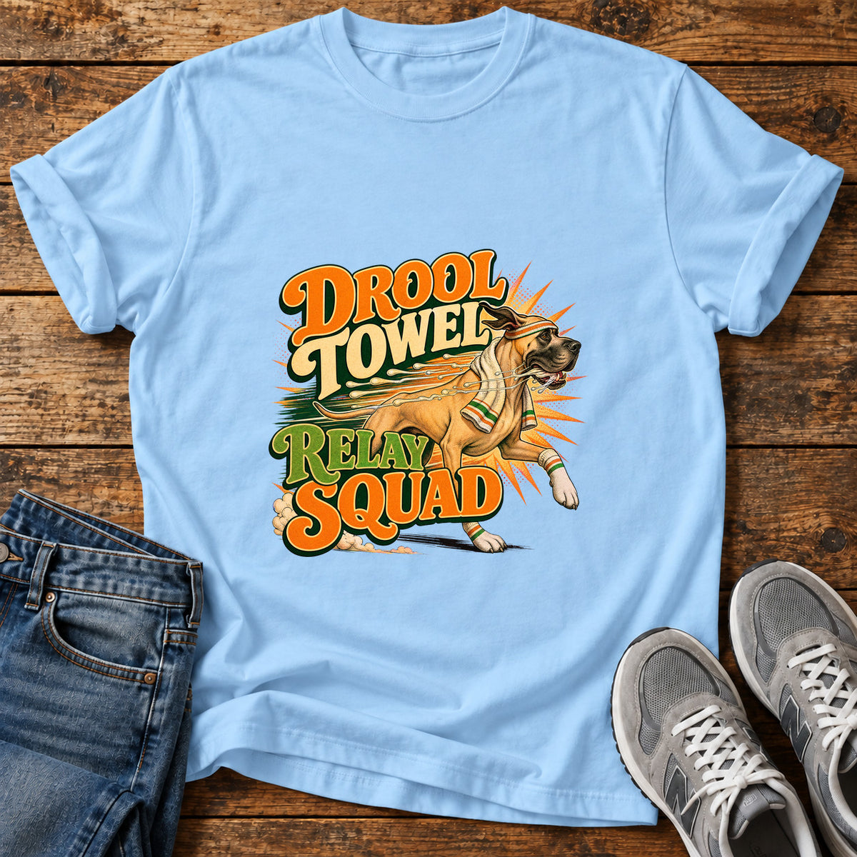 Drool Towel Squad Great Dane graphic T-shirt in Light Blue, shown on a flat-lay shirt mockup