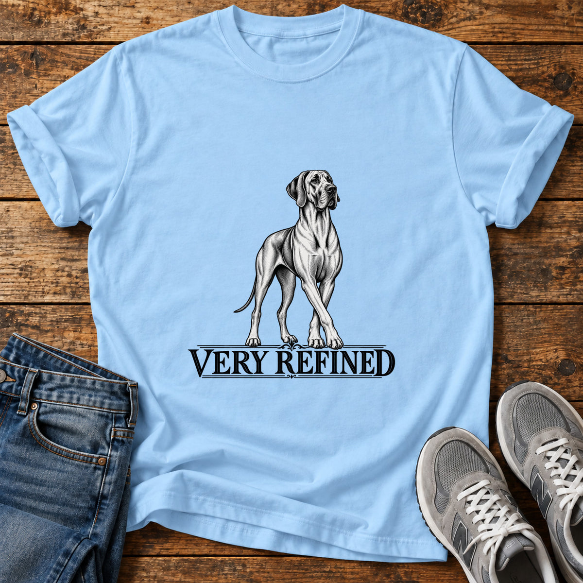 Very Refined Great Dane graphic T-shirt in Light Blue, shown on a flat-lay shirt mockup
