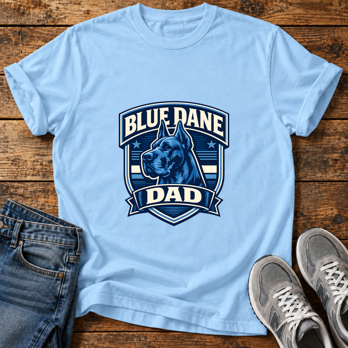 Blue Dane Dad Great Dane graphic T-shirt in Light Blue, shown on a flat-lay shirt mockup