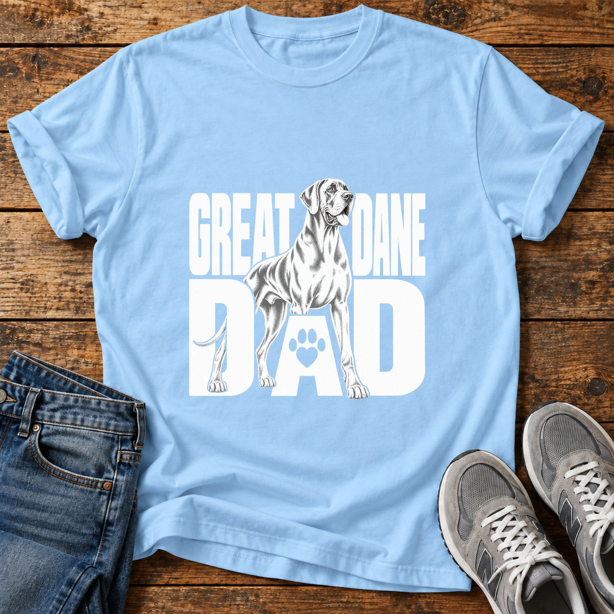 Great Dane Dad graphic T-shirt in Light Blue, shown on a flat-lay shirt mockup