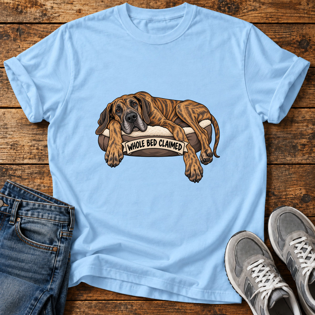 Whole Bed Claimed Great Dane graphic T-shirt in Light Blue, shown on a flat-lay shirt mockup