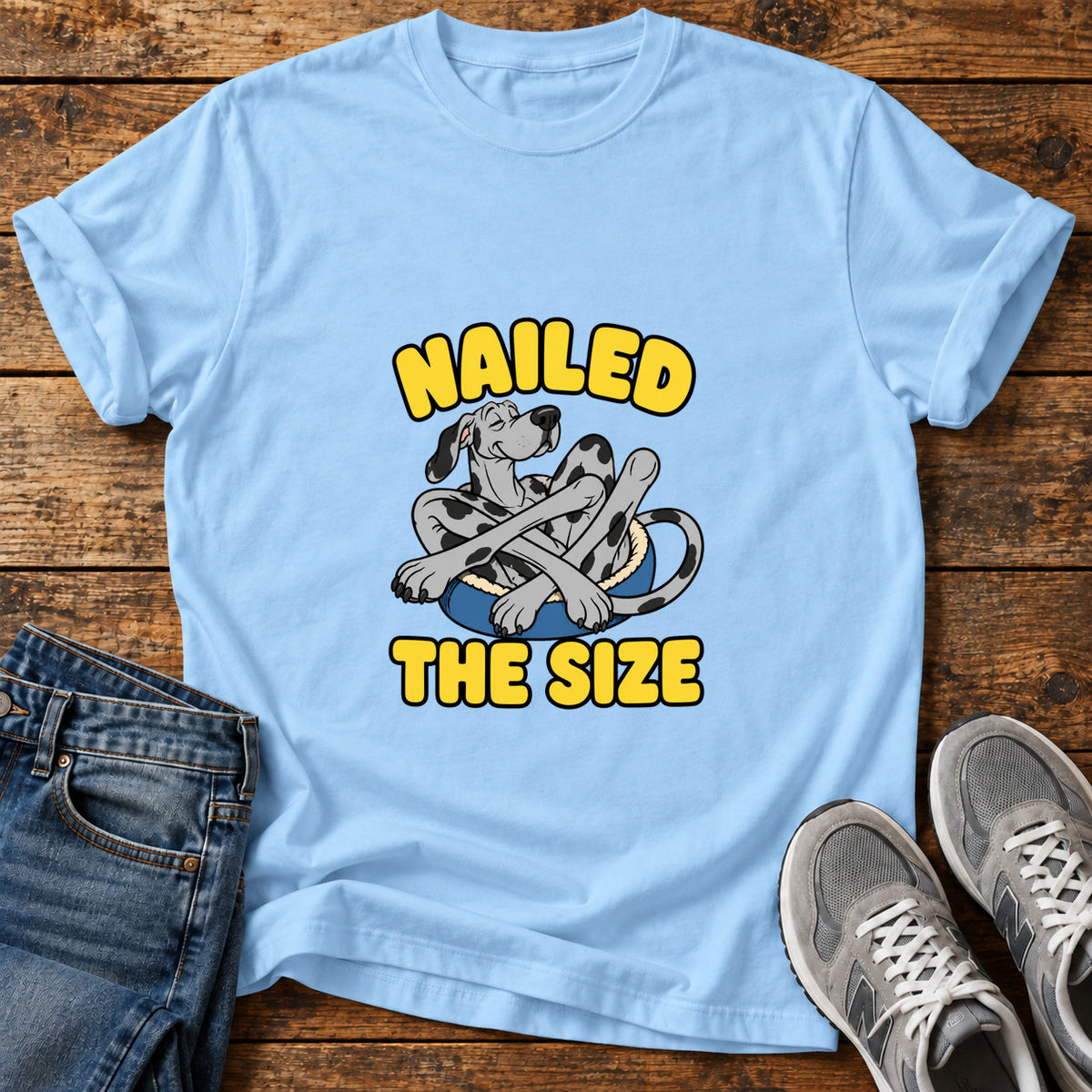 Nailed The Size Great Dane graphic T-shirt in Light Blue, shown on a flat-lay shirt mockup