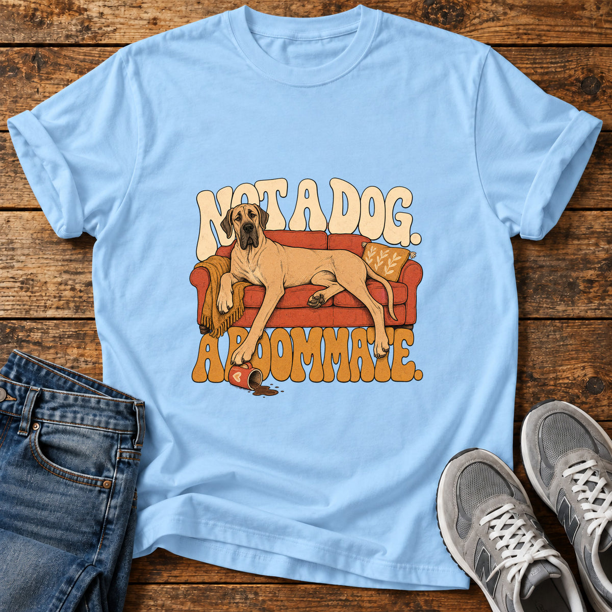 Not A Dog Great Dane graphic T-shirt in Light Blue, shown on a flat-lay shirt mockup