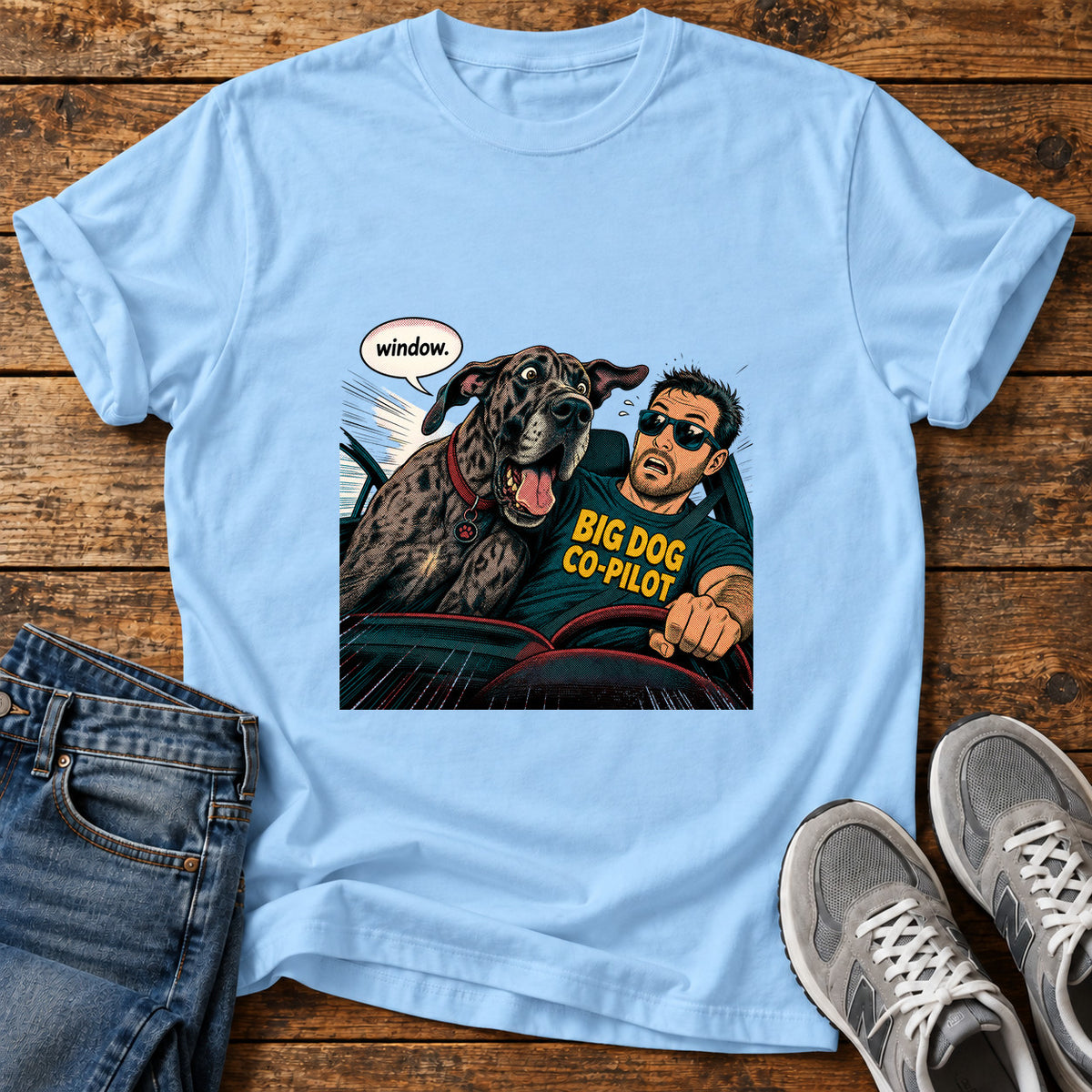 Big Dog Co-Pilot Great Dane graphic T-shirt in Light Blue, shown on a flat-lay shirt mockup