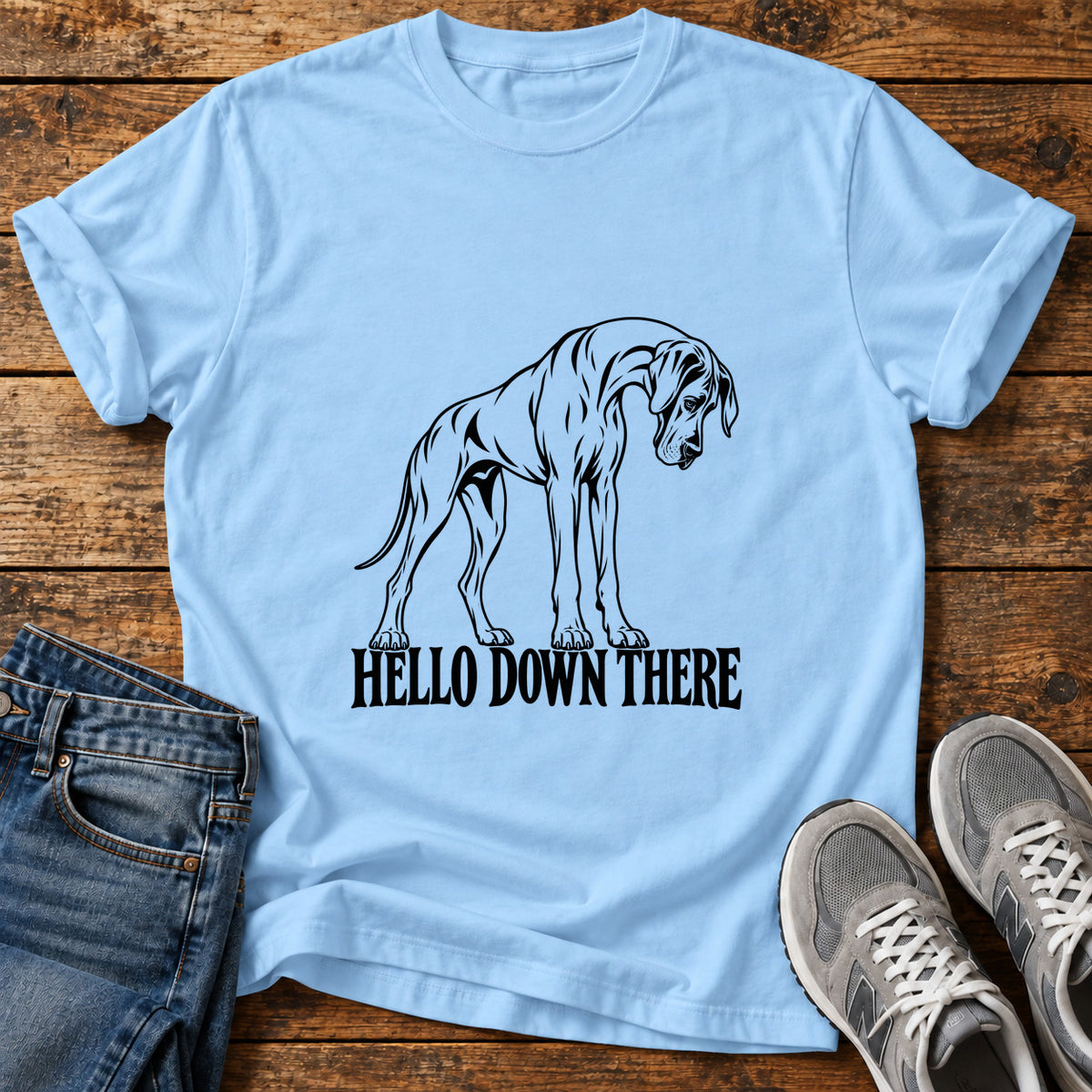 Hello Down There Great Dane graphic T-shirt in Light Blue, shown on a flat-lay shirt mockup