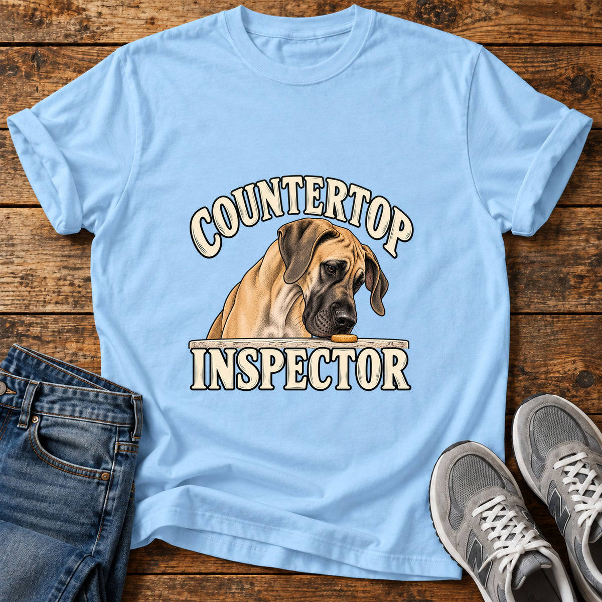 Countertop Inspector Great Dane graphic T-shirt in Light Blue, shown on a flat-lay shirt mockup