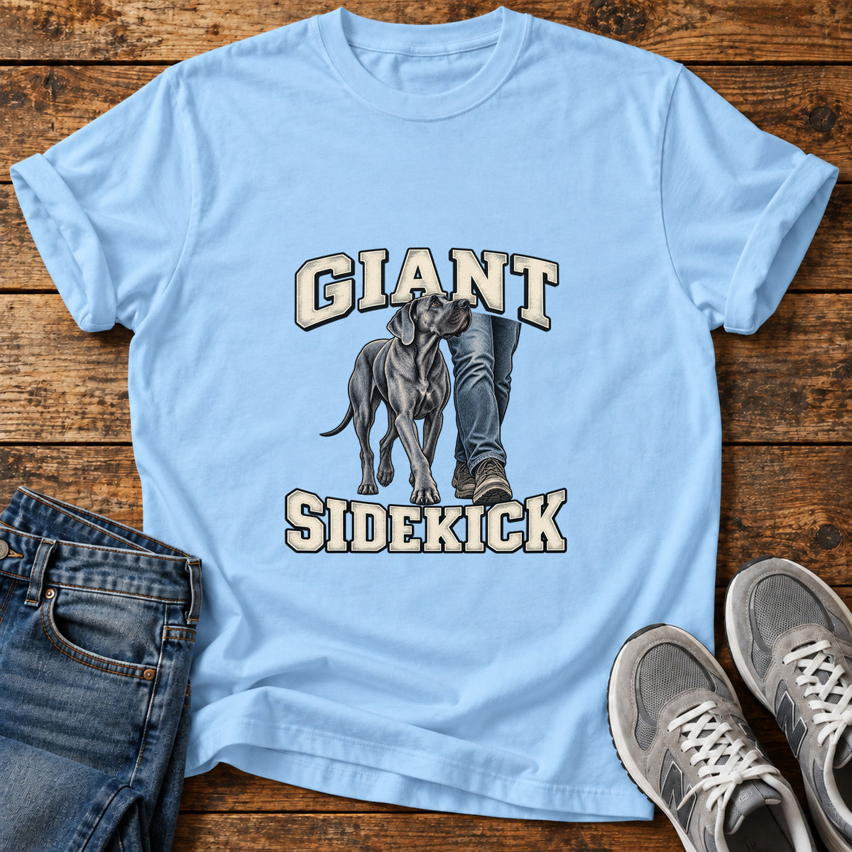 Giant Sidekick Great Dane graphic T-shirt in Light Blue, shown on a flat-lay shirt mockup