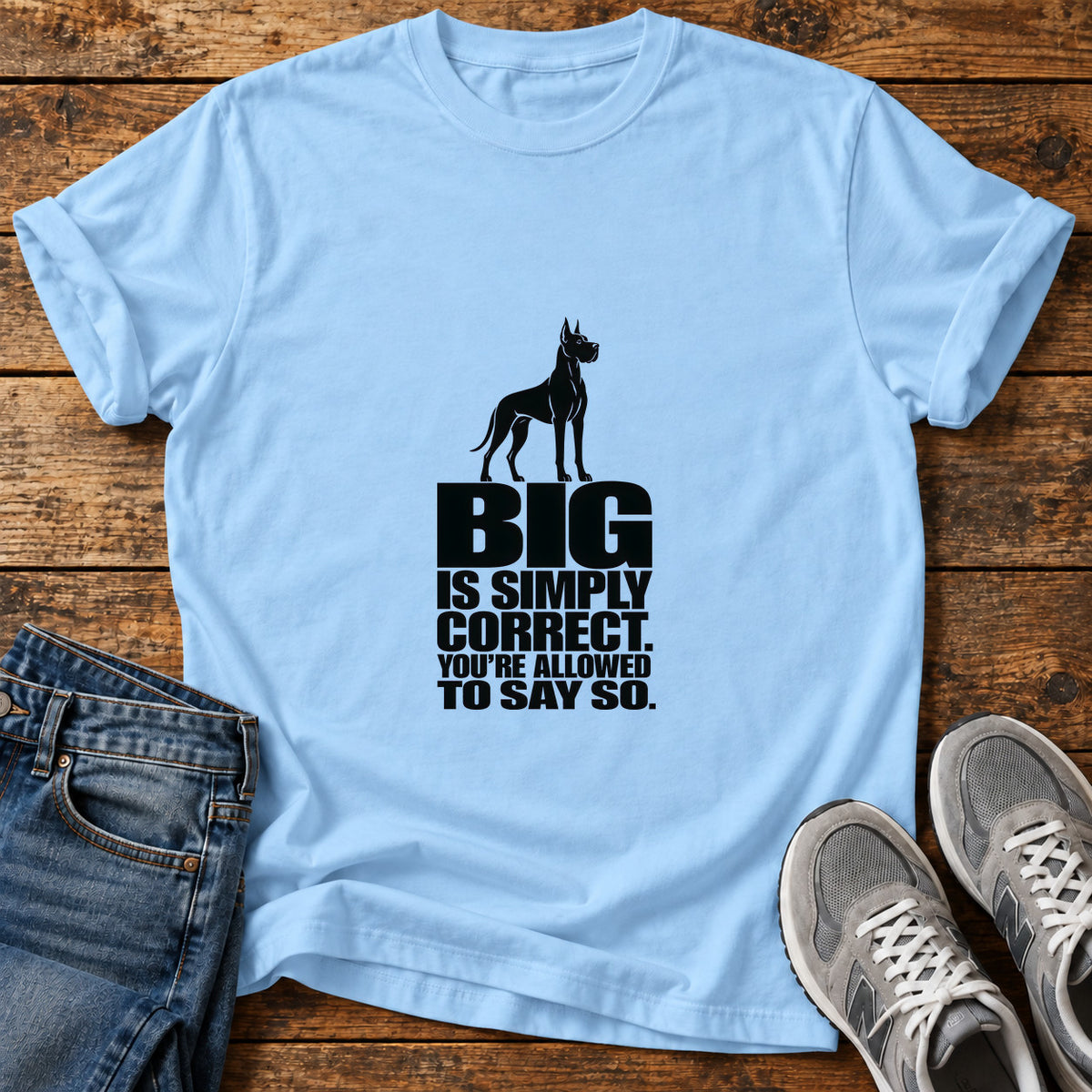Big Simply Correct Great Dane graphic T-shirt in Light Blue, shown on a flat-lay shirt mockup