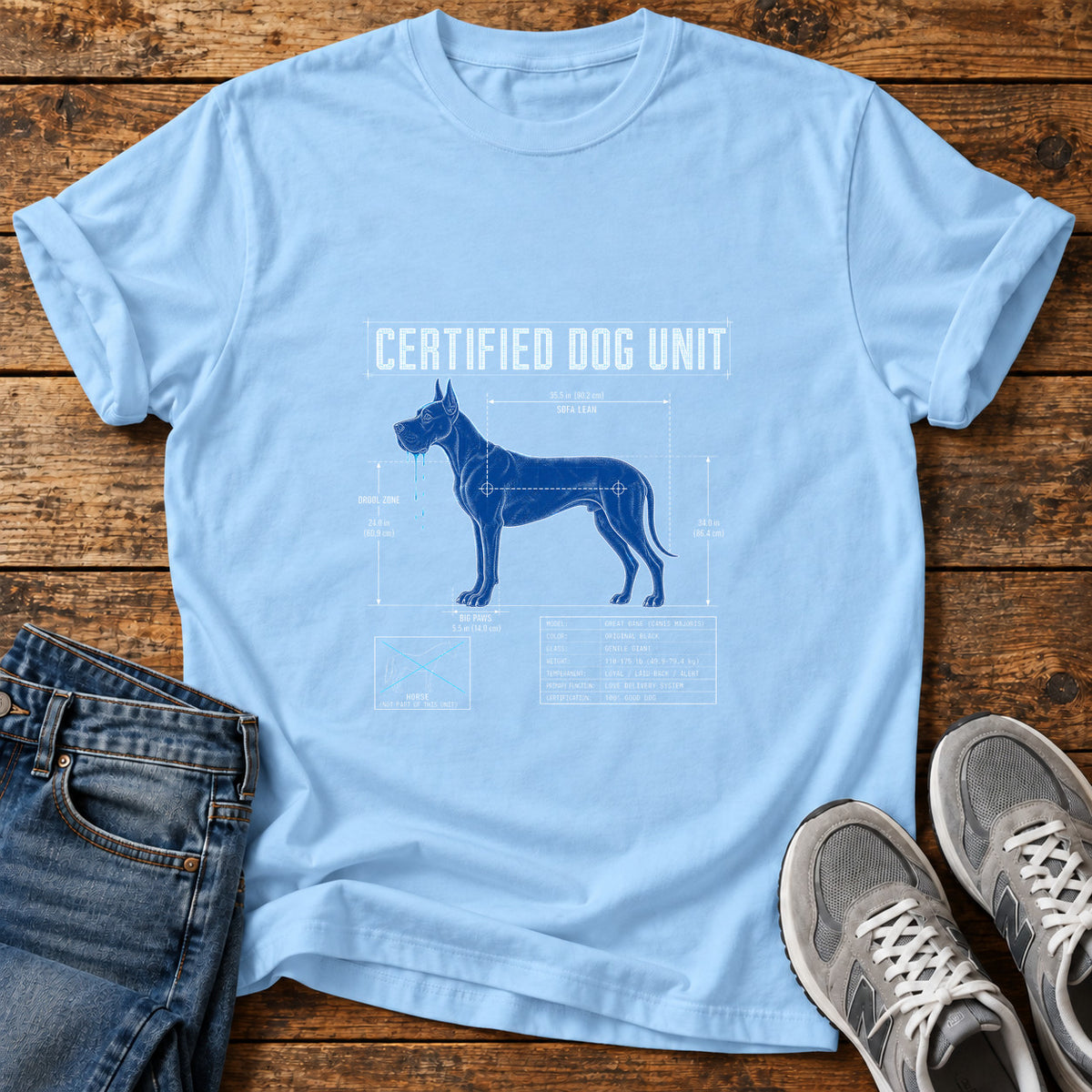 Certified Dog Unit Great Dane graphic T-shirt in Light Blue, shown on a flat-lay shirt mockup