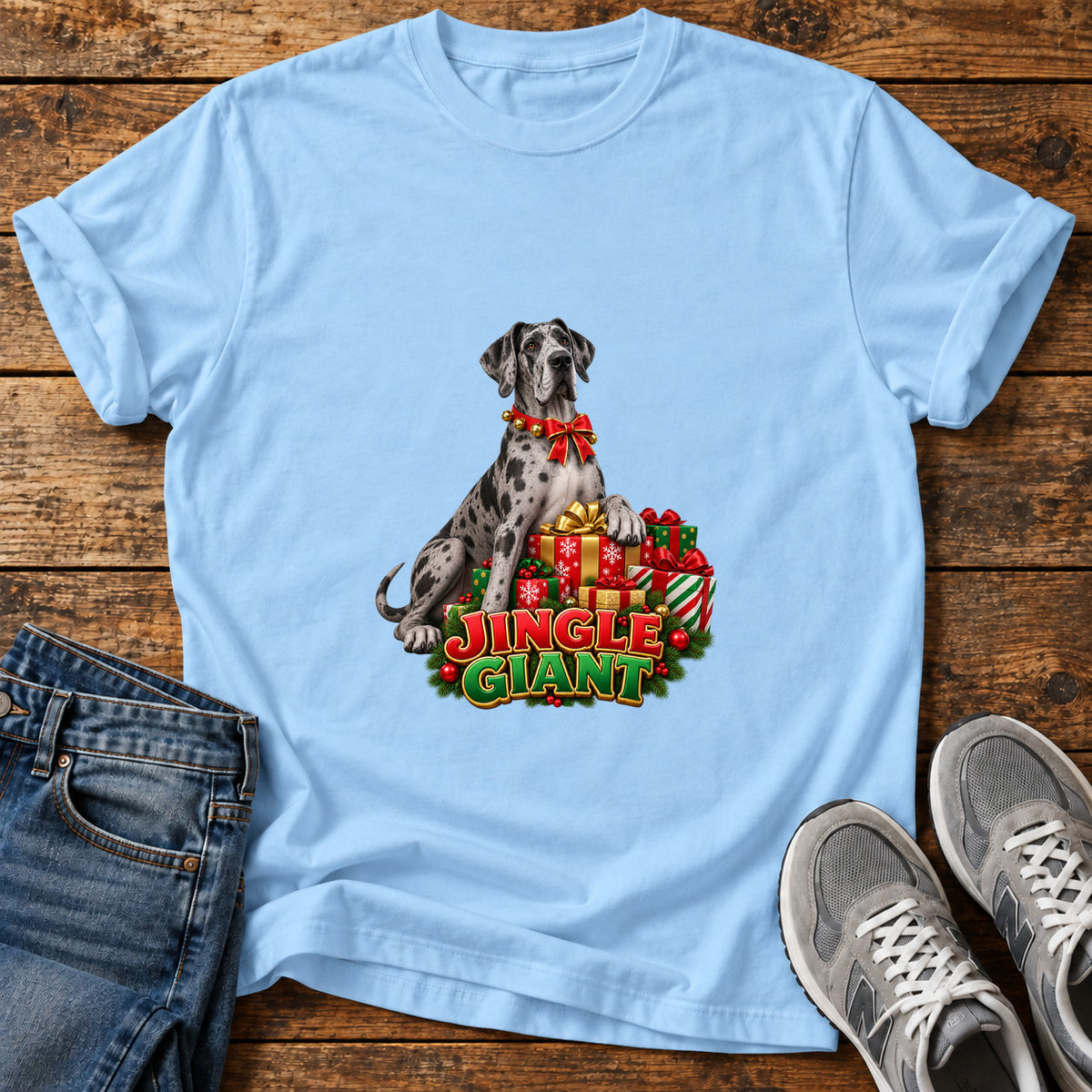 Jingle Giant Great Dane graphic T-shirt in Light Blue, shown on a flat-lay shirt mockup
