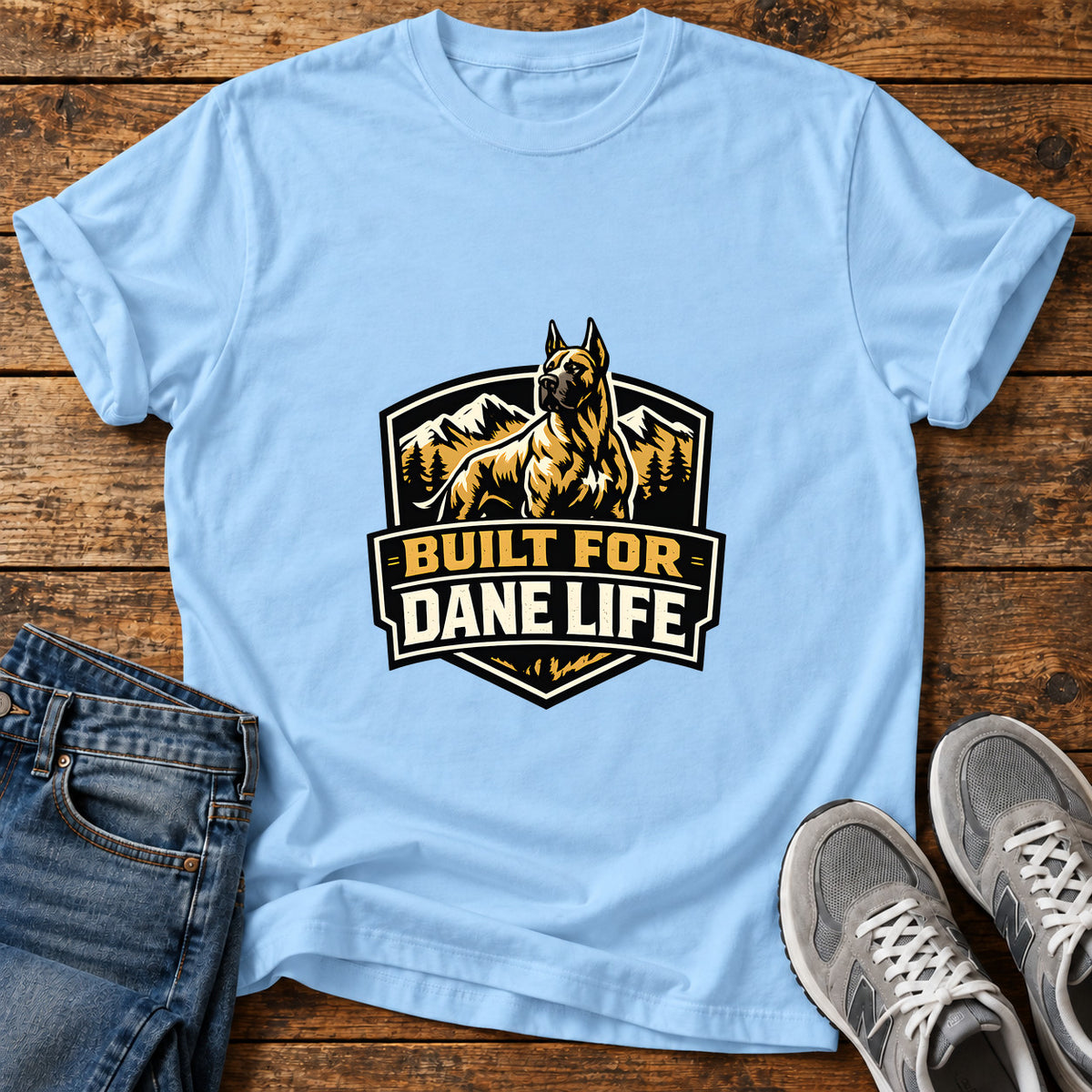 Dane Life Great Dane graphic T-shirt in Light Blue, shown on a flat-lay shirt mockup