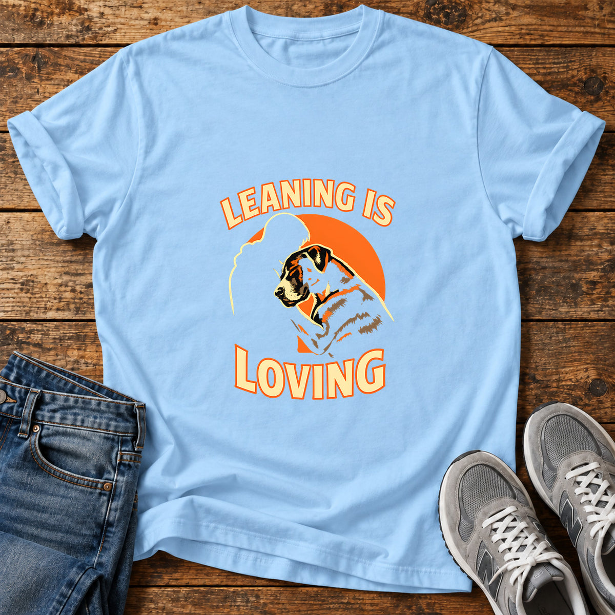 Leaning Is Loving Great Dane graphic T-shirt in Light Blue, shown on a flat-lay shirt mockup