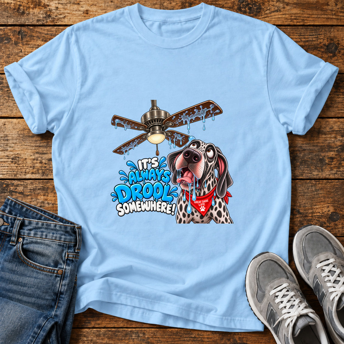 Always Drool Great Dane graphic T-shirt in Light Blue, shown on a flat-lay shirt mockup