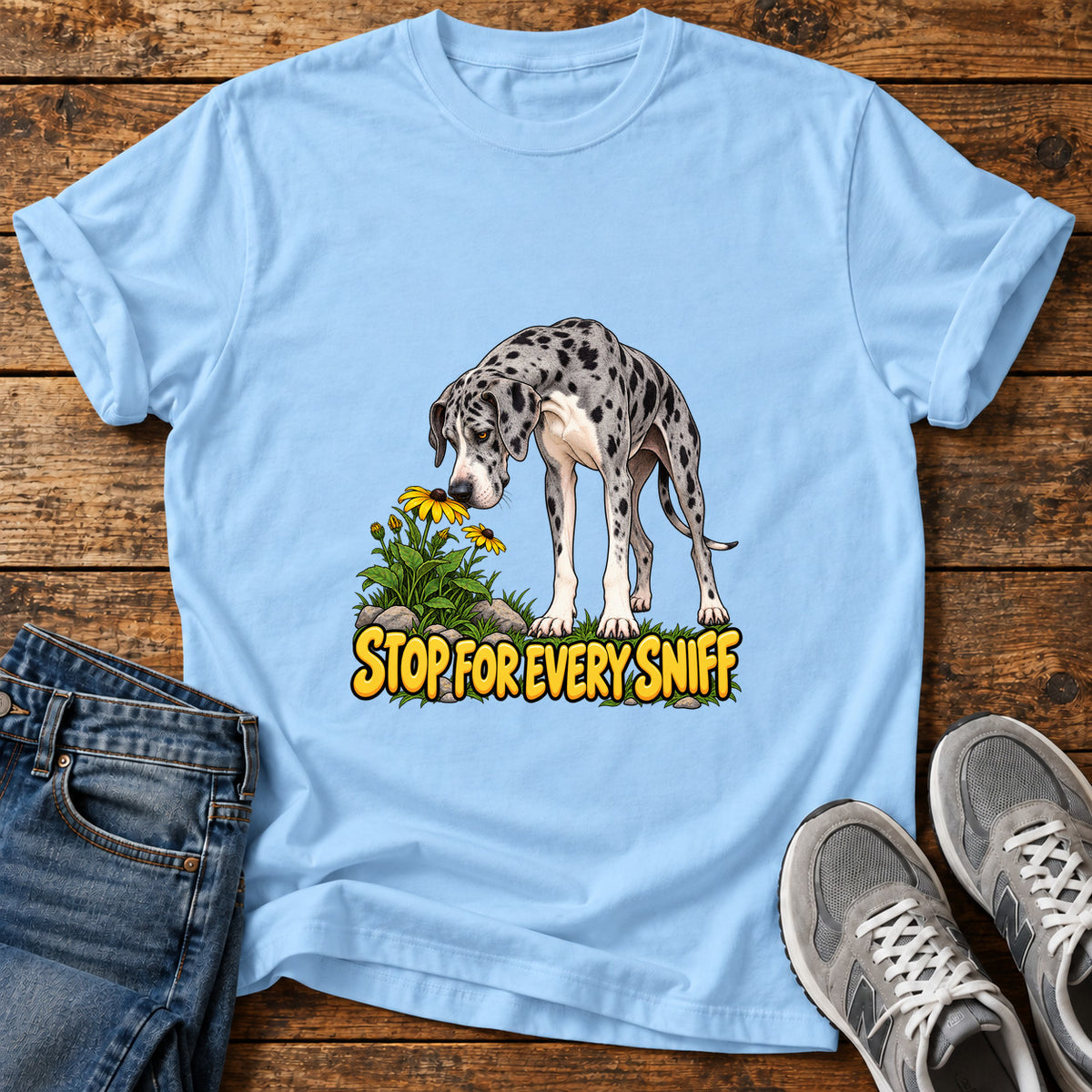 Stop Sniffing Time Great Dane graphic T-shirt in Light Blue, shown on a flat-lay shirt mockup