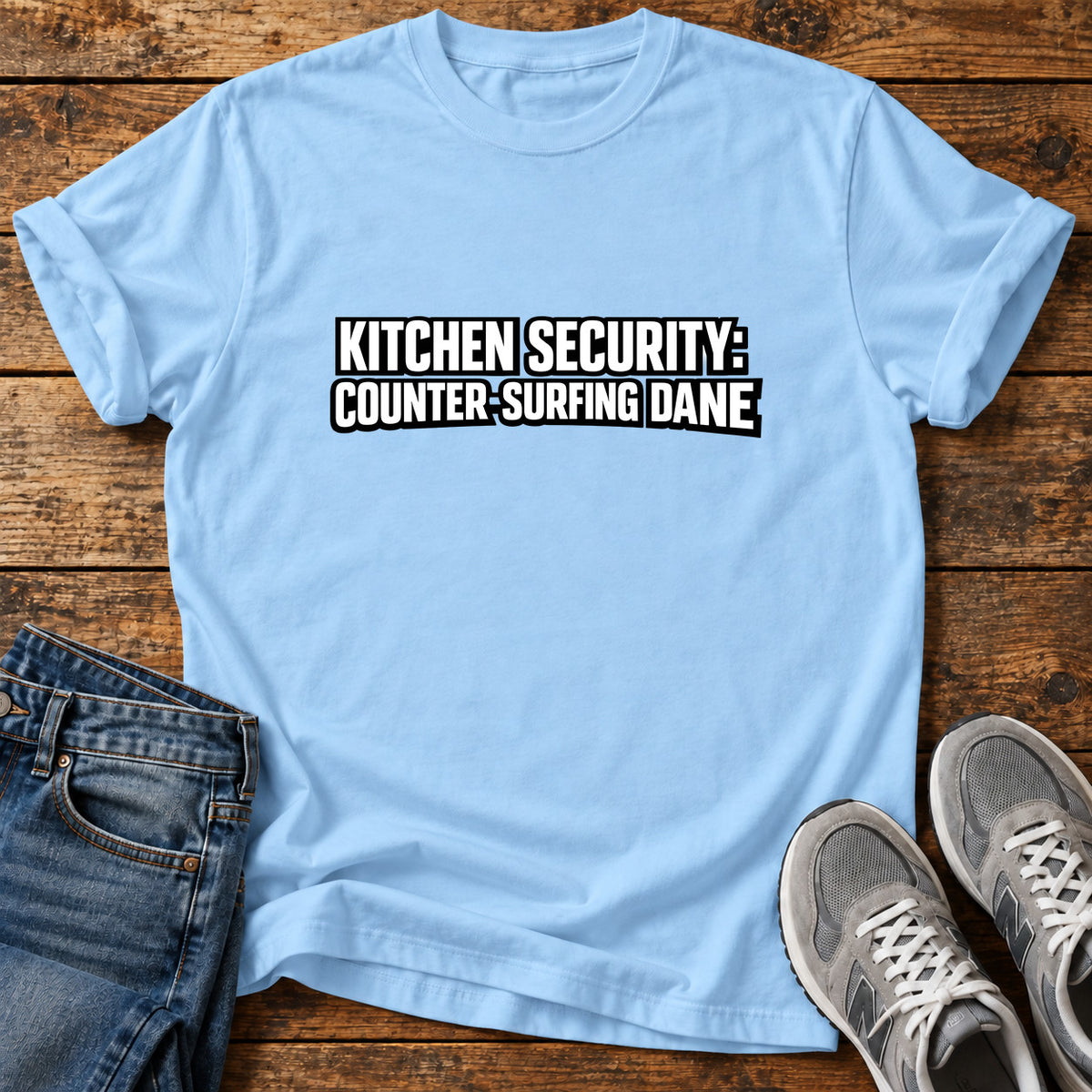 Kitchen Security Great Dane graphic T-shirt in Light Blue, shown on a flat-lay shirt mockup