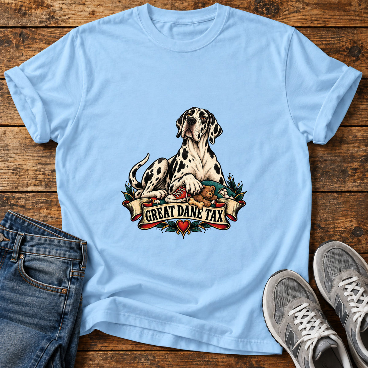 Great Dane Tax graphic T-shirt in Light Blue, shown on a flat-lay shirt mockup
