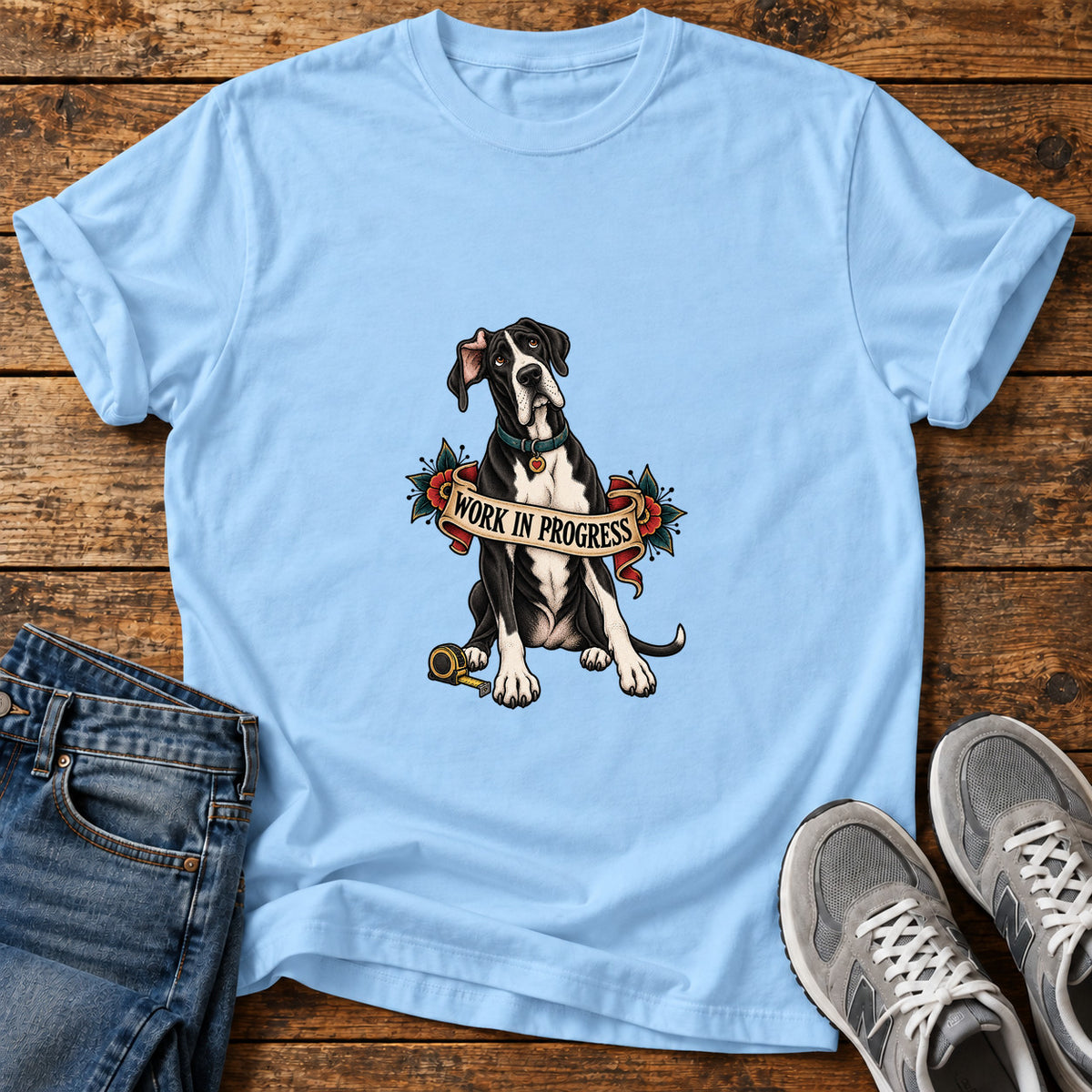 Work In Progress Great Dane graphic T-shirt in Light Blue, shown on a flat-lay shirt mockup