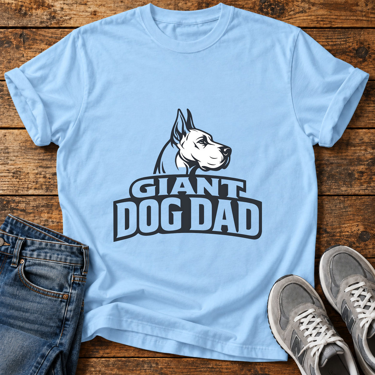 Giant Dog Dad Great Dane graphic T-shirt in Light Blue, shown on a flat-lay shirt mockup