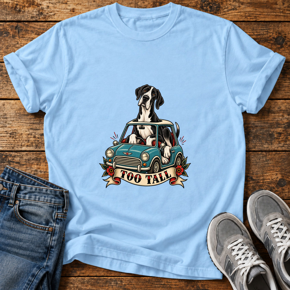 Too Tall Pup Great Dane graphic T-shirt in Light Blue, shown on a flat-lay shirt mockup