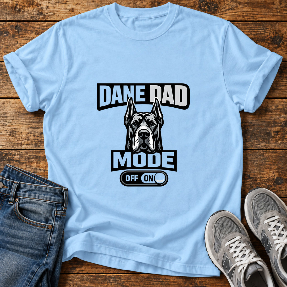Dane Dad Mode Great Dane graphic T-shirt in Light Blue, shown on a flat-lay shirt mockup