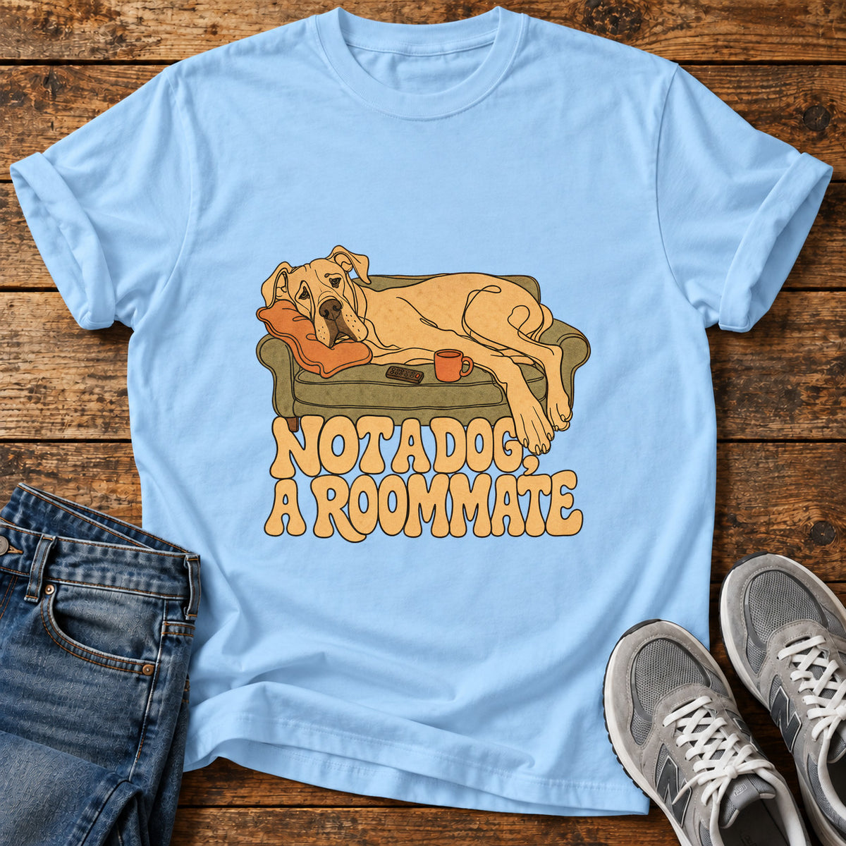 Not A Roommate Great Dane graphic T-shirt in Light Blue, shown on a flat-lay shirt mockup