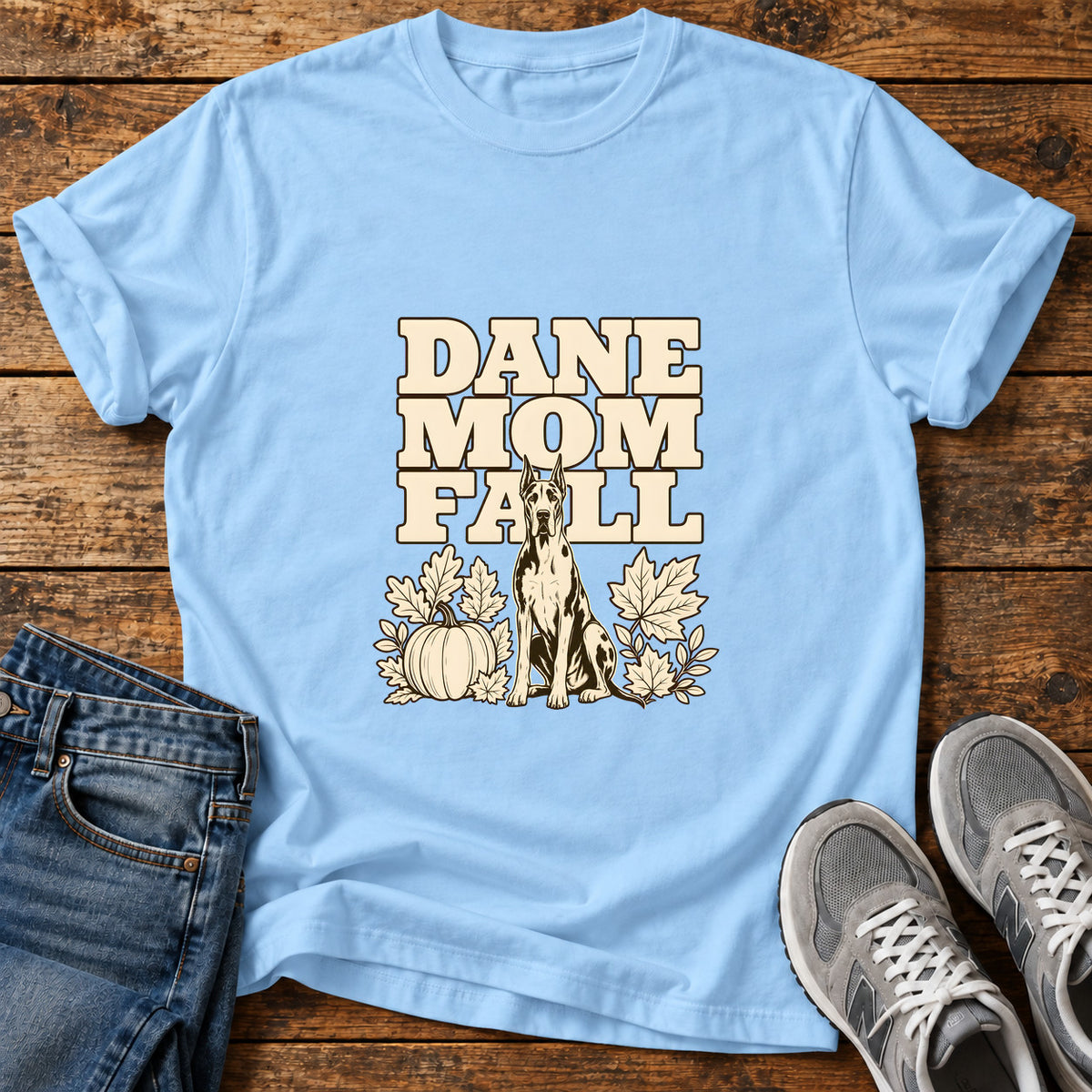 Dane Mom Fall Great Dane graphic T-shirt in Light Blue, shown on a flat-lay shirt mockup