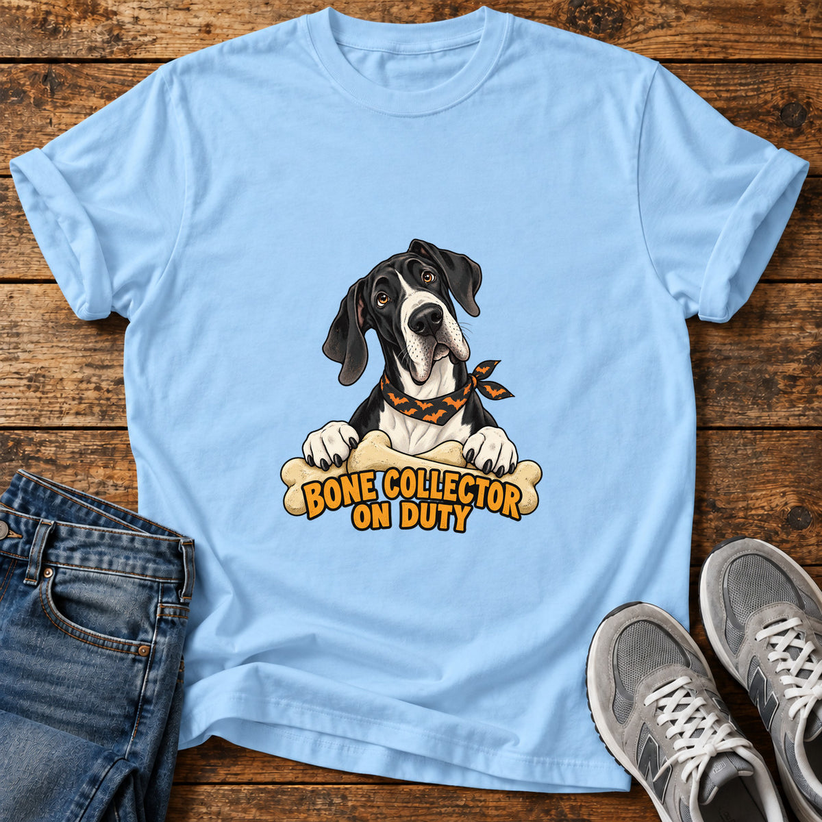 Bone Collector Duty Great Dane graphic T-shirt in Light Blue, shown on a flat-lay shirt mockup