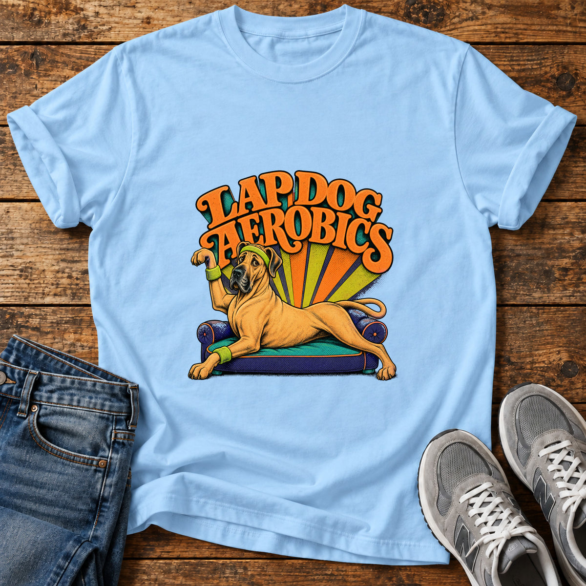 Lap Dog Aerobics Great Dane graphic T-shirt in Light Blue, shown on a flat-lay shirt mockup