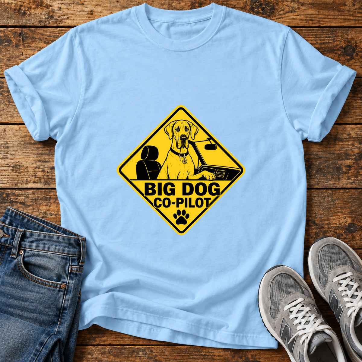 Big Dog Co-Pilot Great Dane graphic T-shirt in Light Blue, shown on a flat-lay shirt mockup