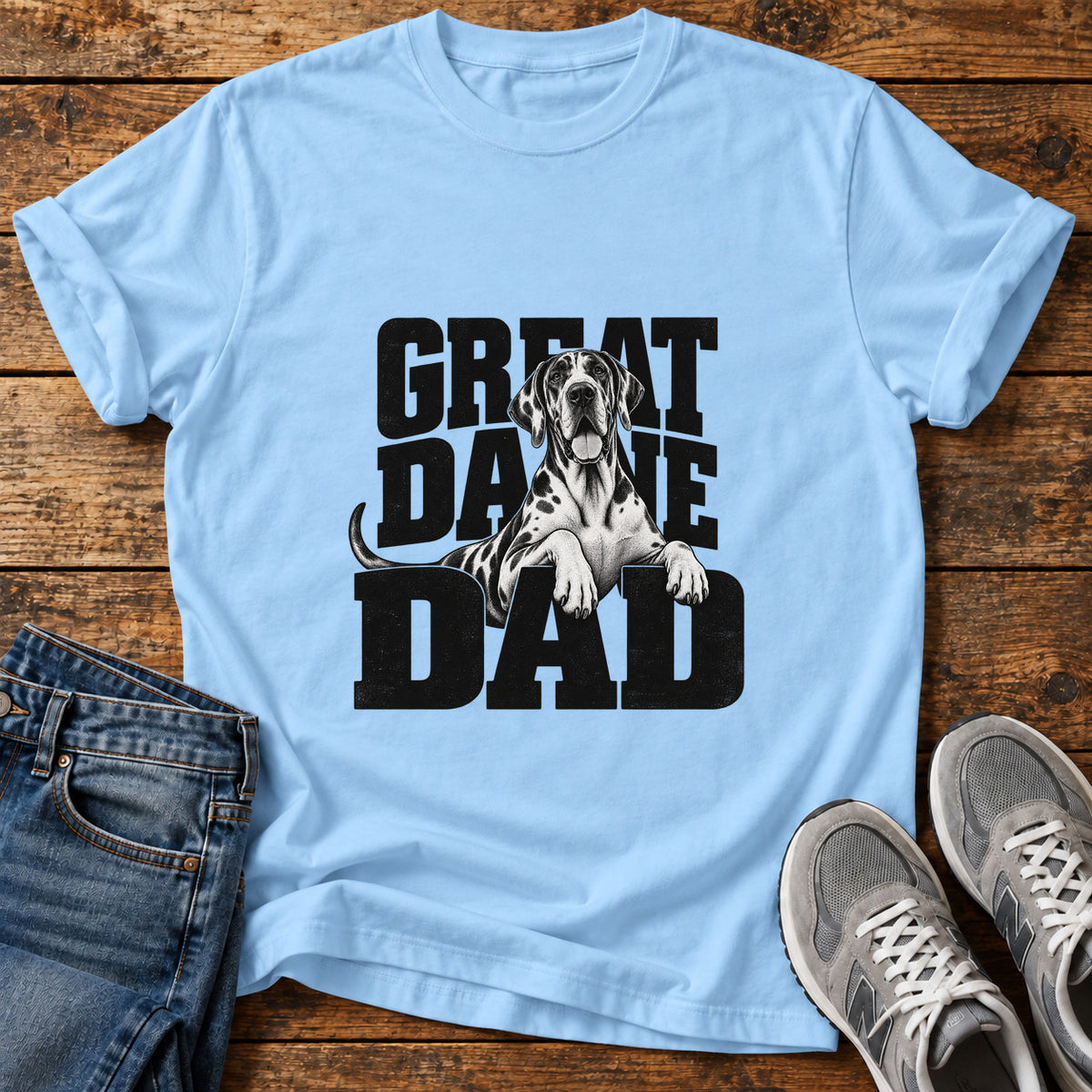 Great Dane Dad graphic T-shirt in Light Blue, shown on a flat-lay shirt mockup
