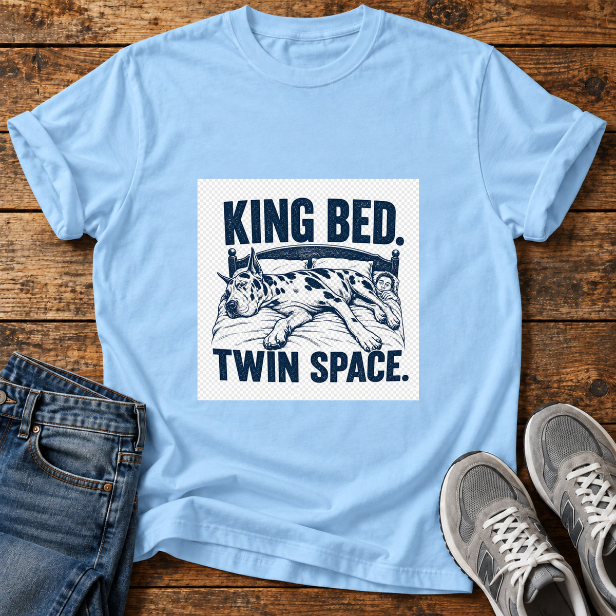 King Bed Great Dane graphic T-shirt in Light Blue, shown on a flat-lay shirt mockup