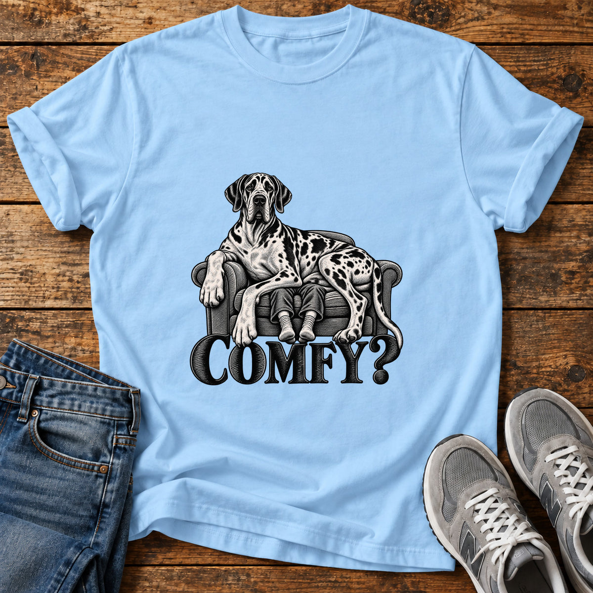 Comfy Canine Great Dane graphic T-shirt in Light Blue, shown on a flat-lay shirt mockup