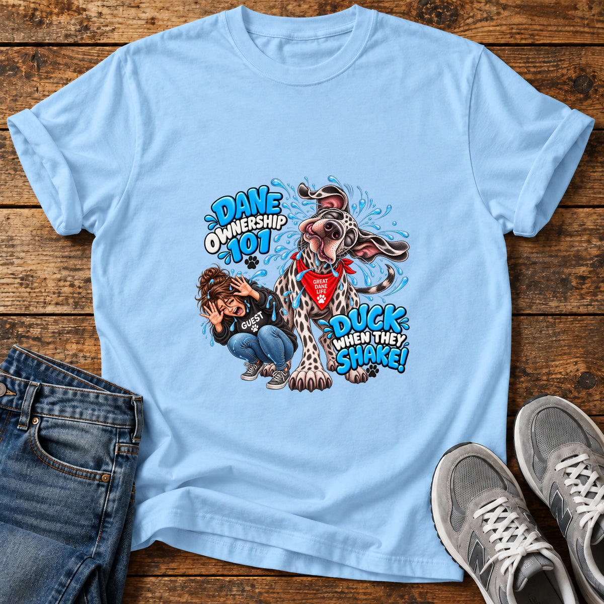 Dane Ownership 101 Great Dane graphic T-shirt in Light Blue, shown on a flat-lay shirt mockup