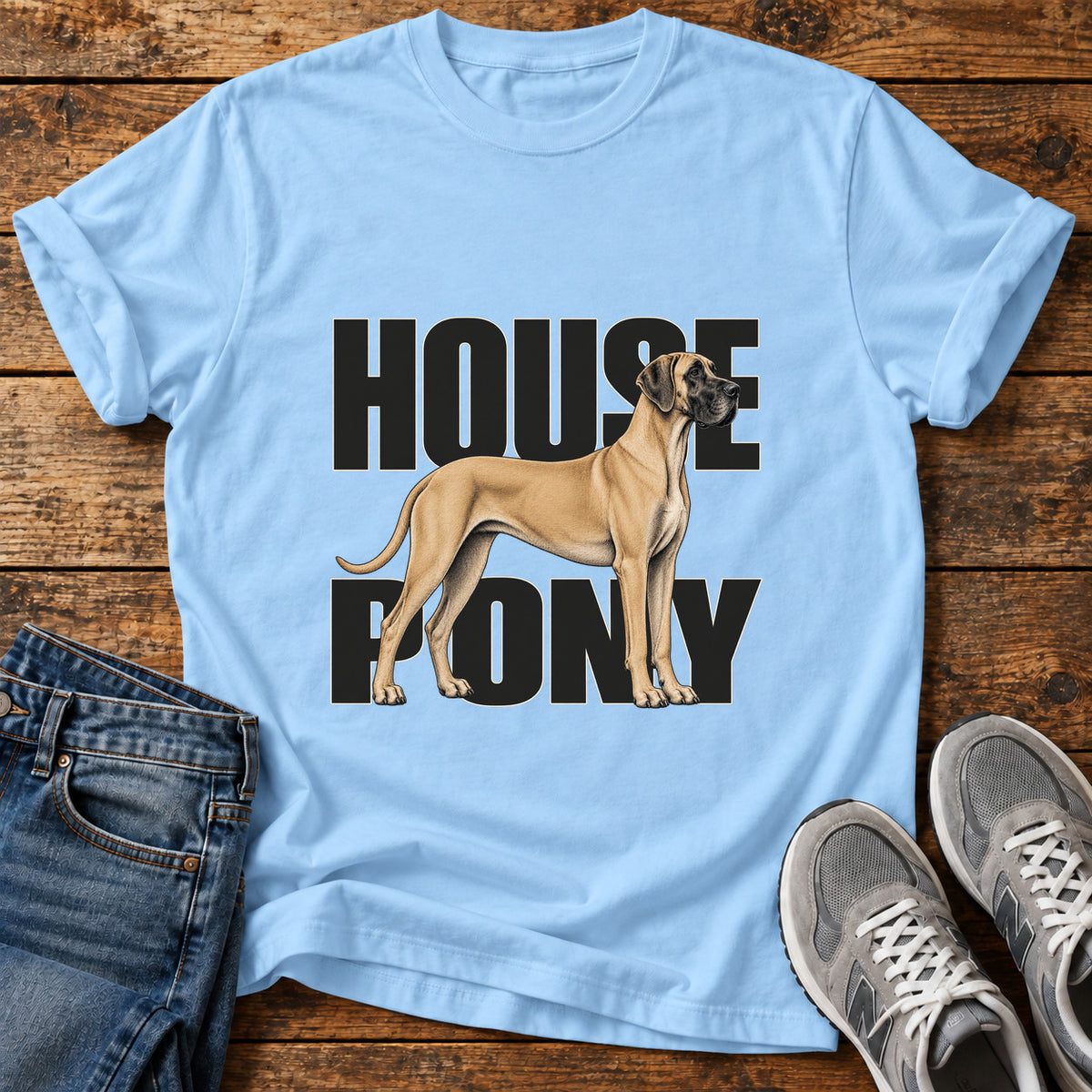 House Pony Great Dane graphic T-shirt in Light Blue, shown on a flat-lay shirt mockup