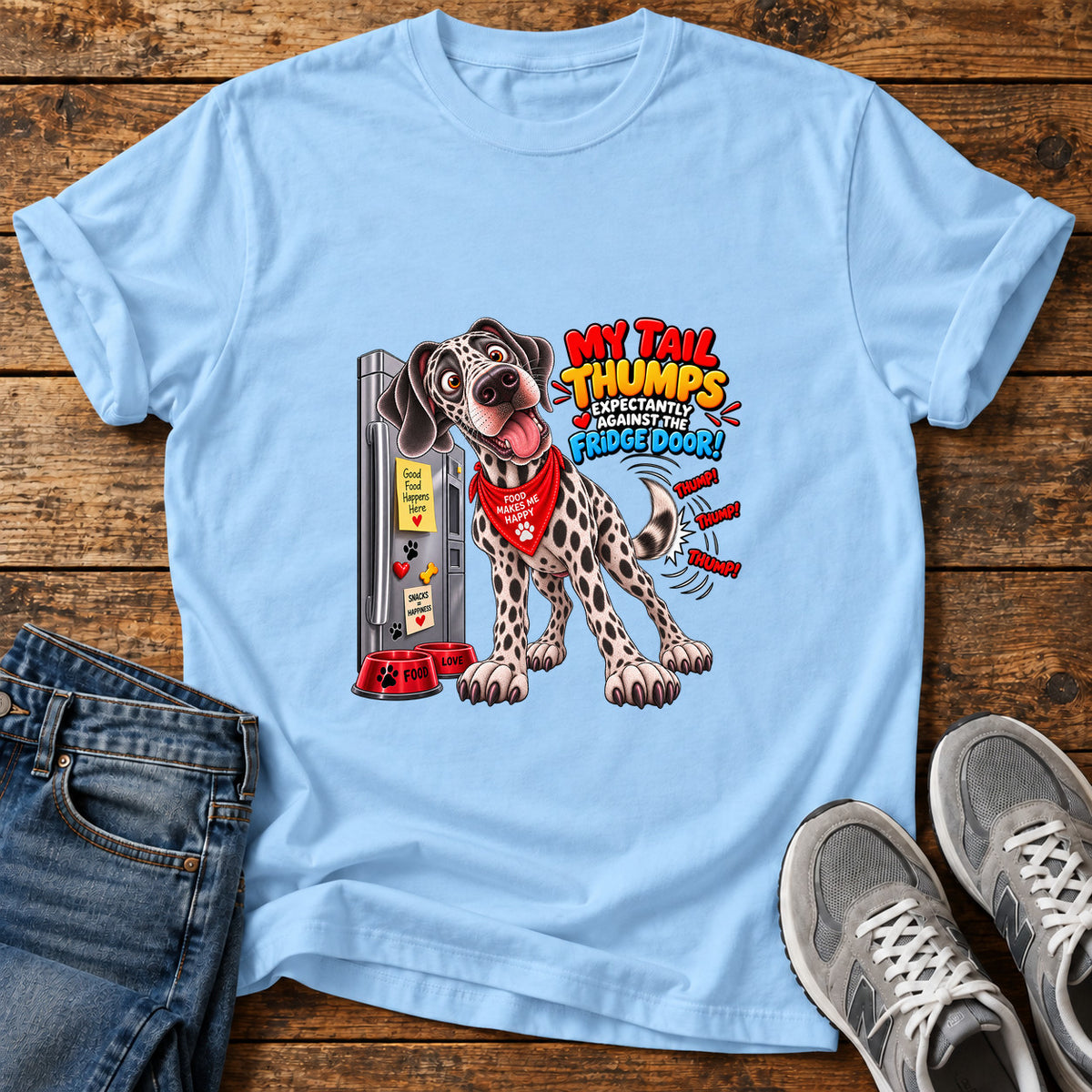 My Tail Thumps Great Dane graphic T-shirt in Light Blue, shown on a flat-lay shirt mockup