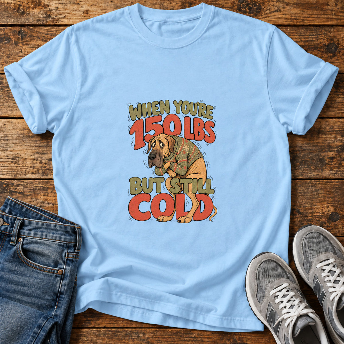Still Cold Great Dane graphic T-shirt in Light Blue, shown on a flat-lay shirt mockup