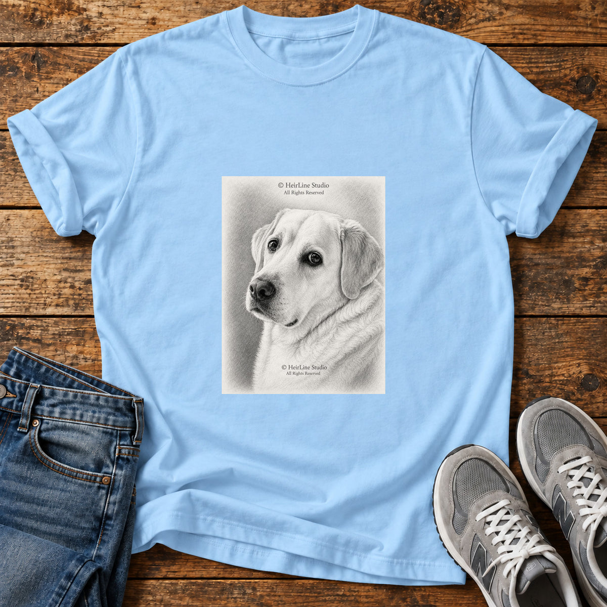 Gentle Lab Great Dane graphic T-shirt in Light Blue, shown on a flat-lay shirt mockup
