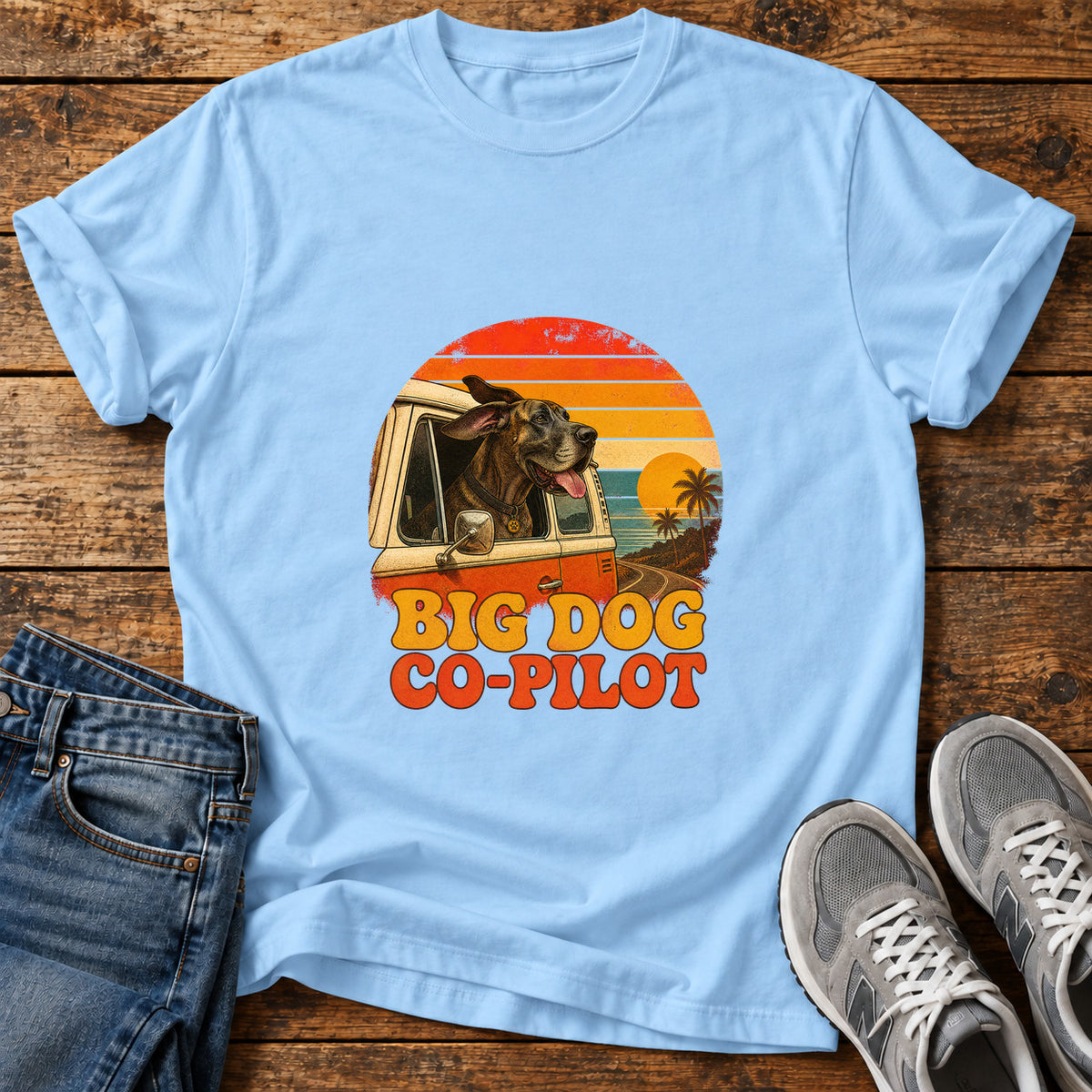 Big Dog Co-Pilot Great Dane graphic T-shirt in Light Blue, shown on a flat-lay shirt mockup