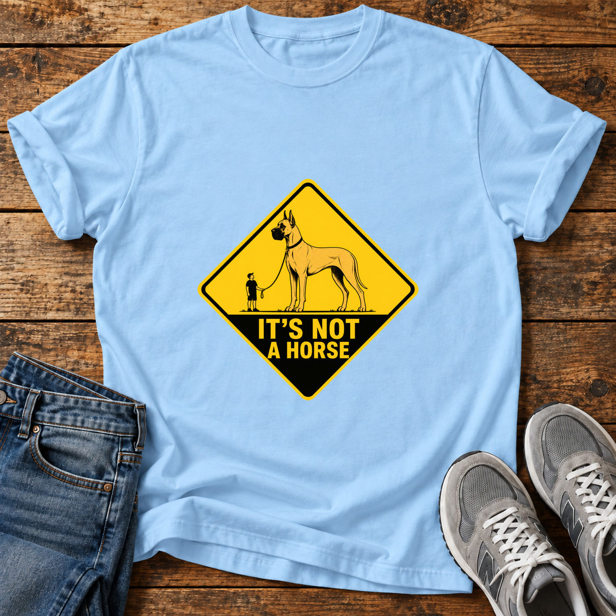 It's Not Horse Great Dane graphic T-shirt in Light Blue, shown on a flat-lay shirt mockup