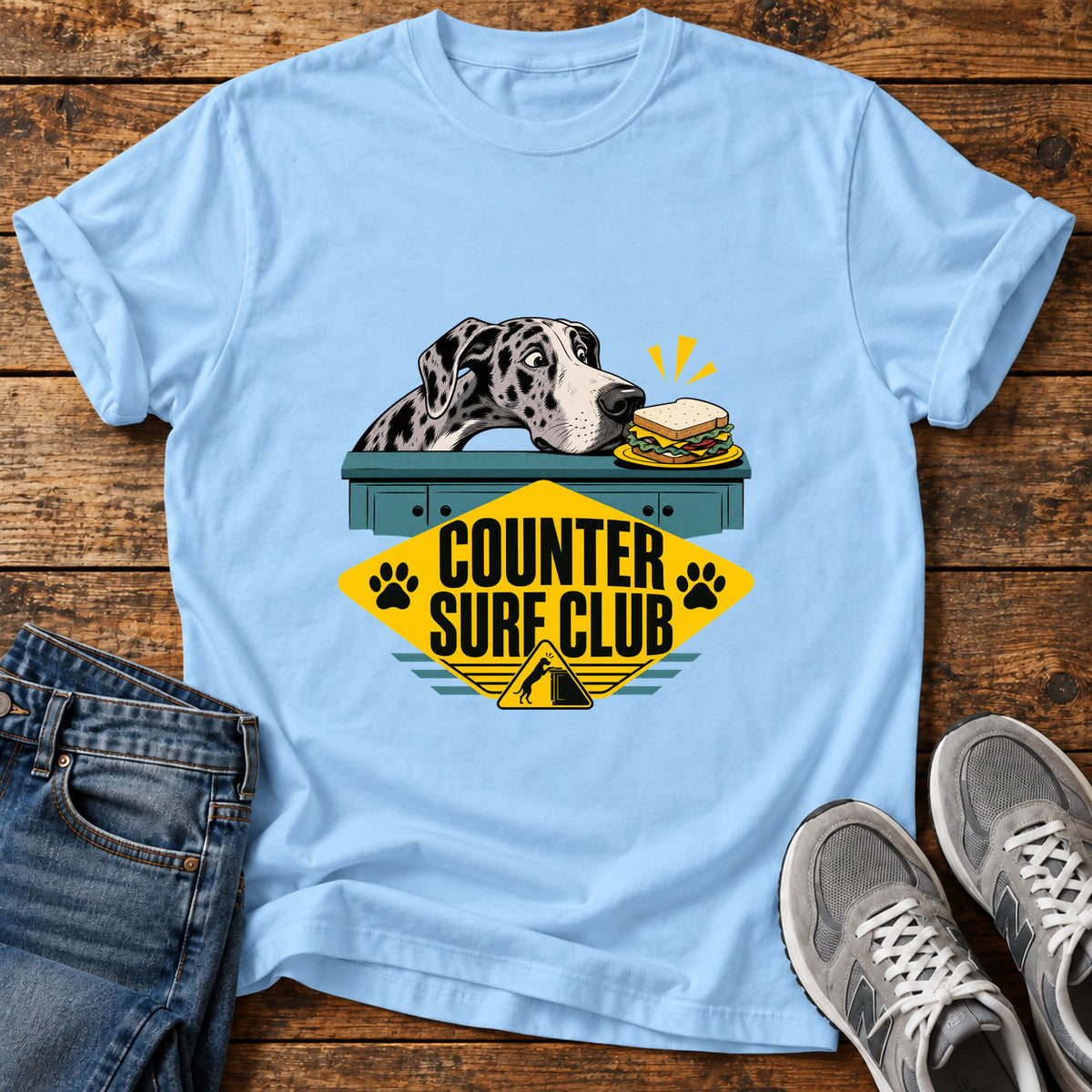Counter Surf Club Great Dane graphic T-shirt in Light Blue, shown on a flat-lay shirt mockup