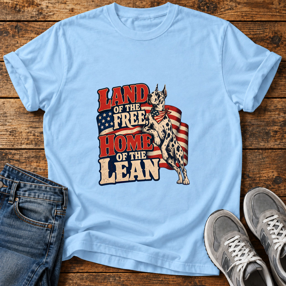 Land Of Lean Great Dane graphic T-shirt in Light Blue, shown on a flat-lay shirt mockup