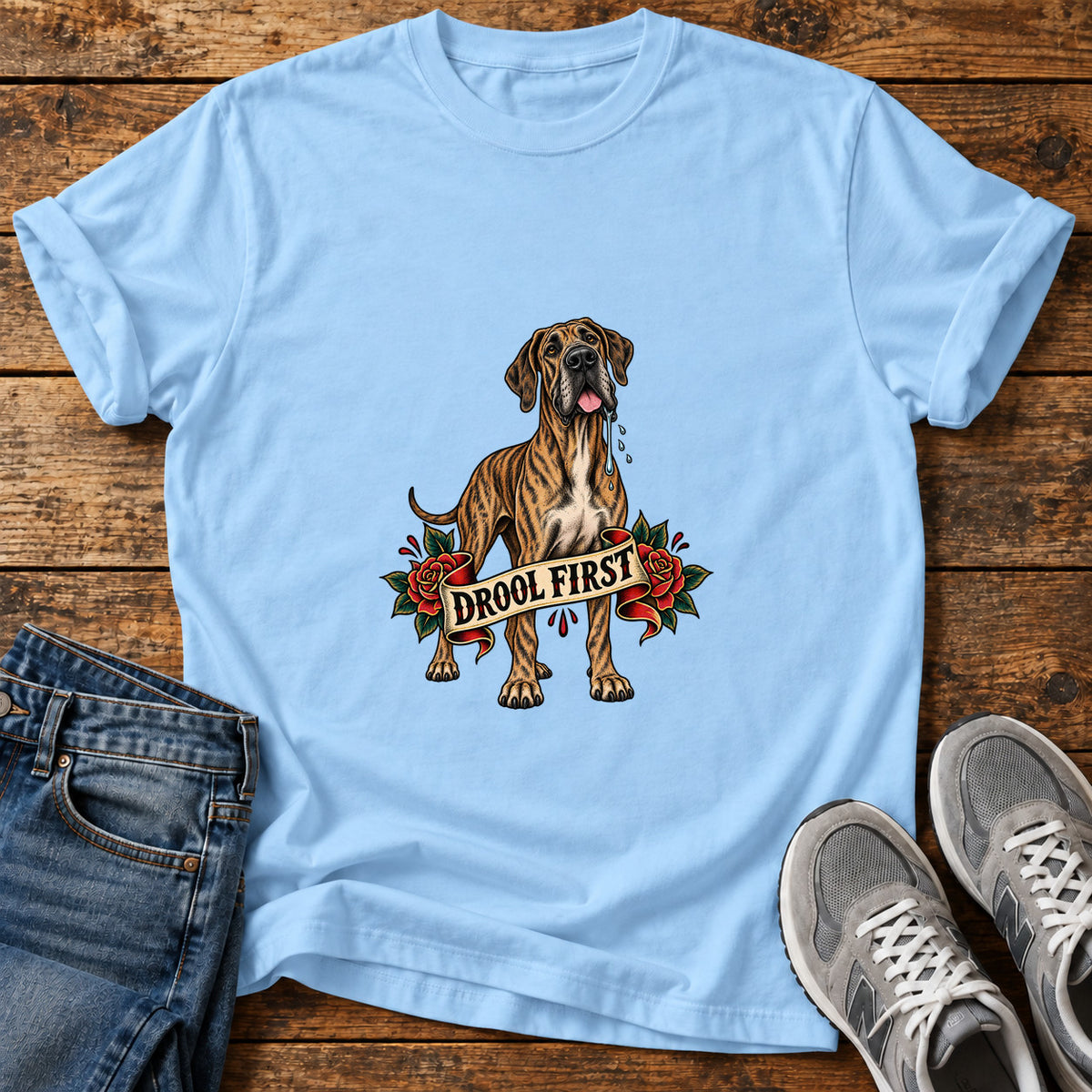 Drool First Great Dane graphic T-shirt in Light Blue, shown on a flat-lay shirt mockup