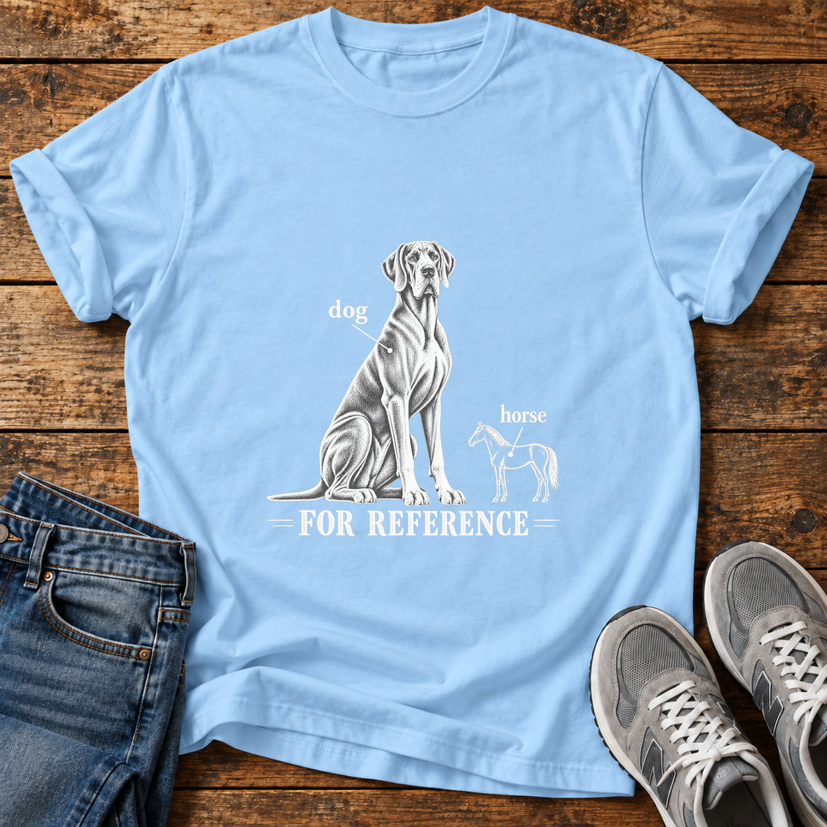 Dog Reference Great Dane graphic T-shirt in Light Blue, shown on a flat-lay shirt mockup