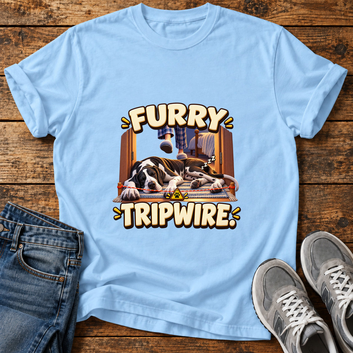 Furry Tripwire Great Dane graphic T-shirt in Light Blue, shown on a flat-lay shirt mockup