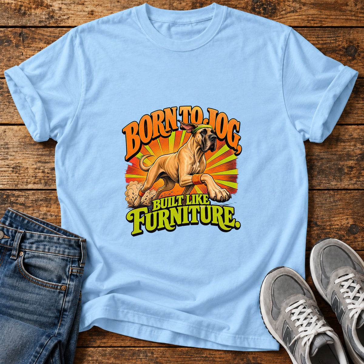 Born To Jog Great Dane graphic T-shirt in Light Blue, shown on a flat-lay shirt mockup